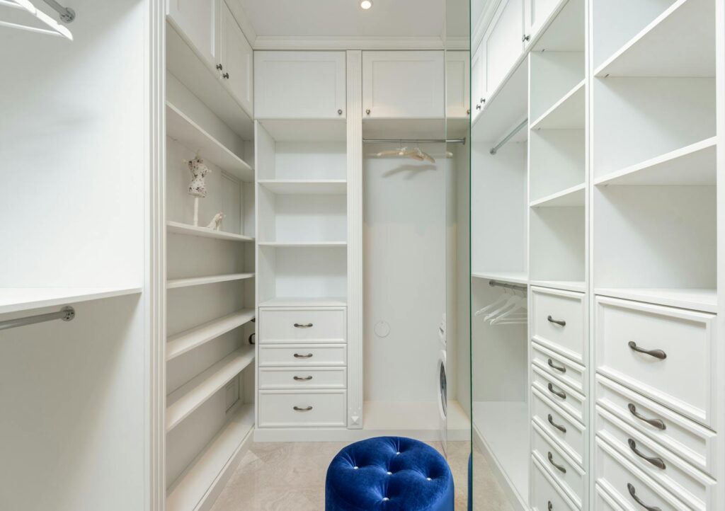 White classic styled built in wardrobe with empty shelves