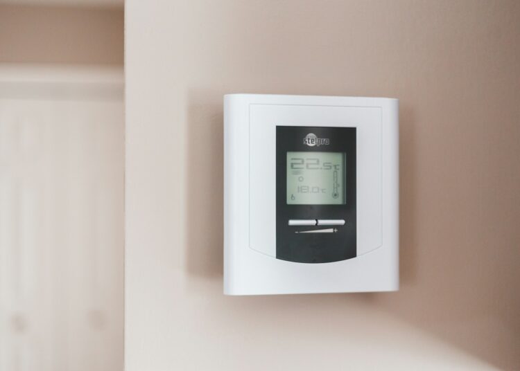 white and gray thermostat at 19 5