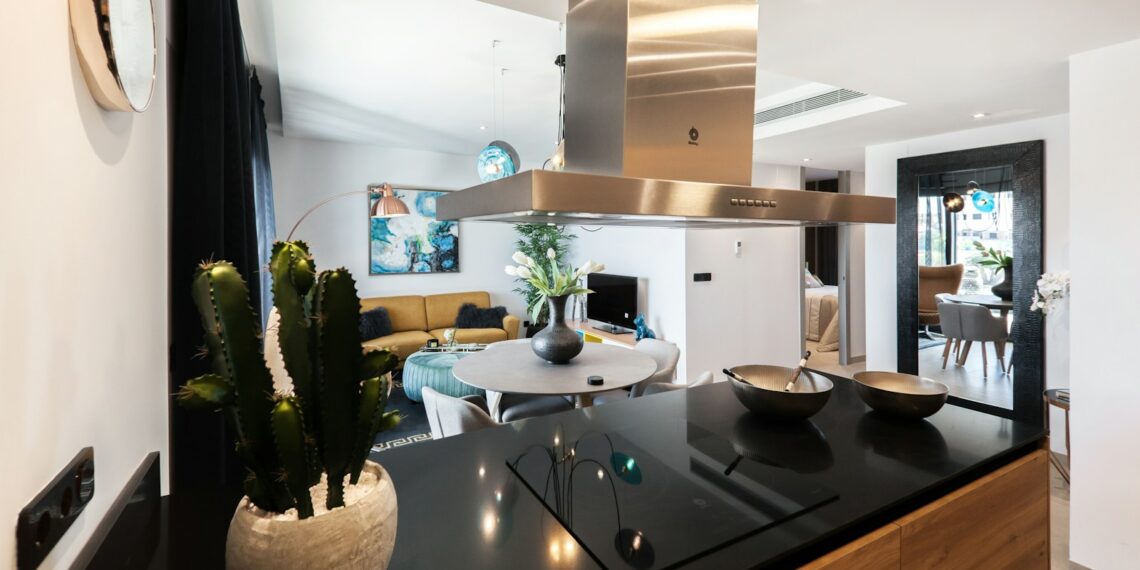 round white wooden table near kitchen island